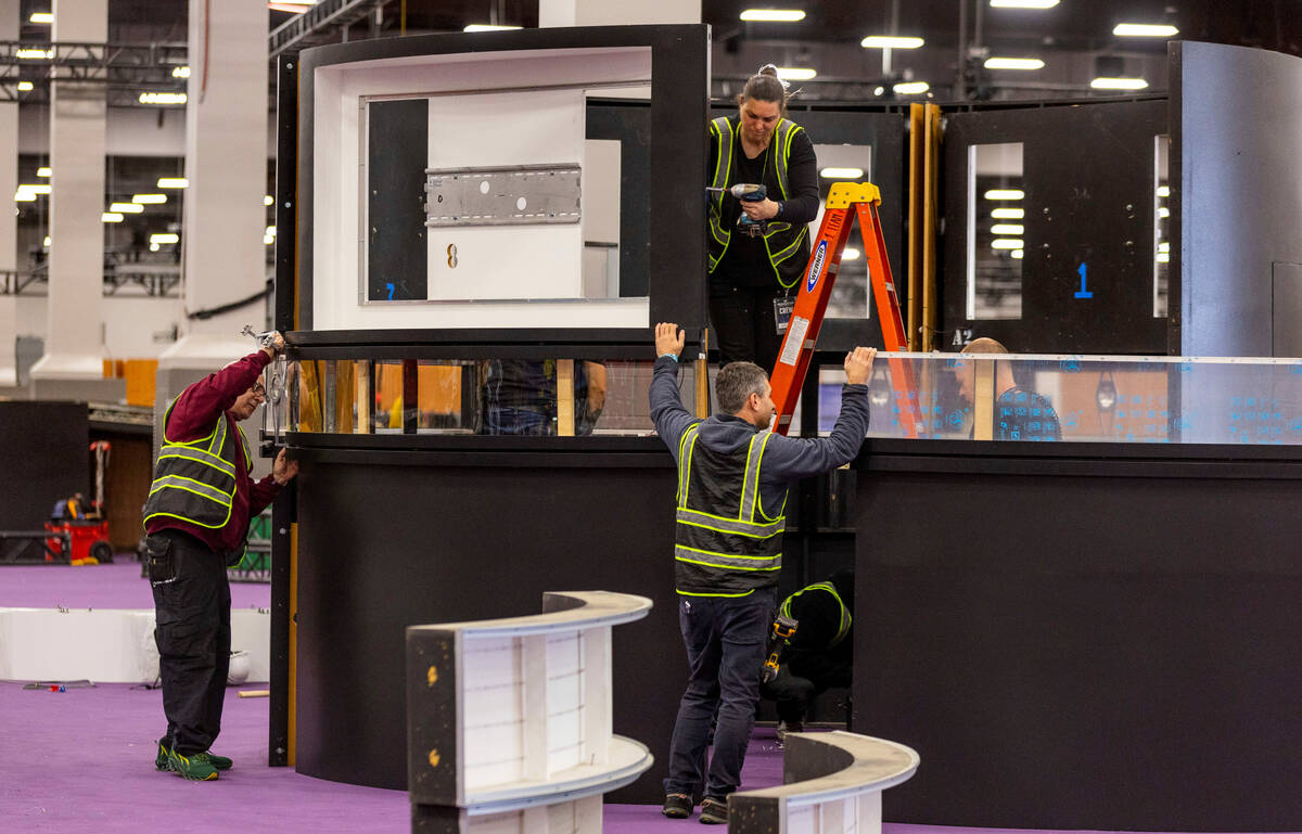 Booths are set up as set-up continues for the Super Bowl Experience at the Mandalay Bay Conv...