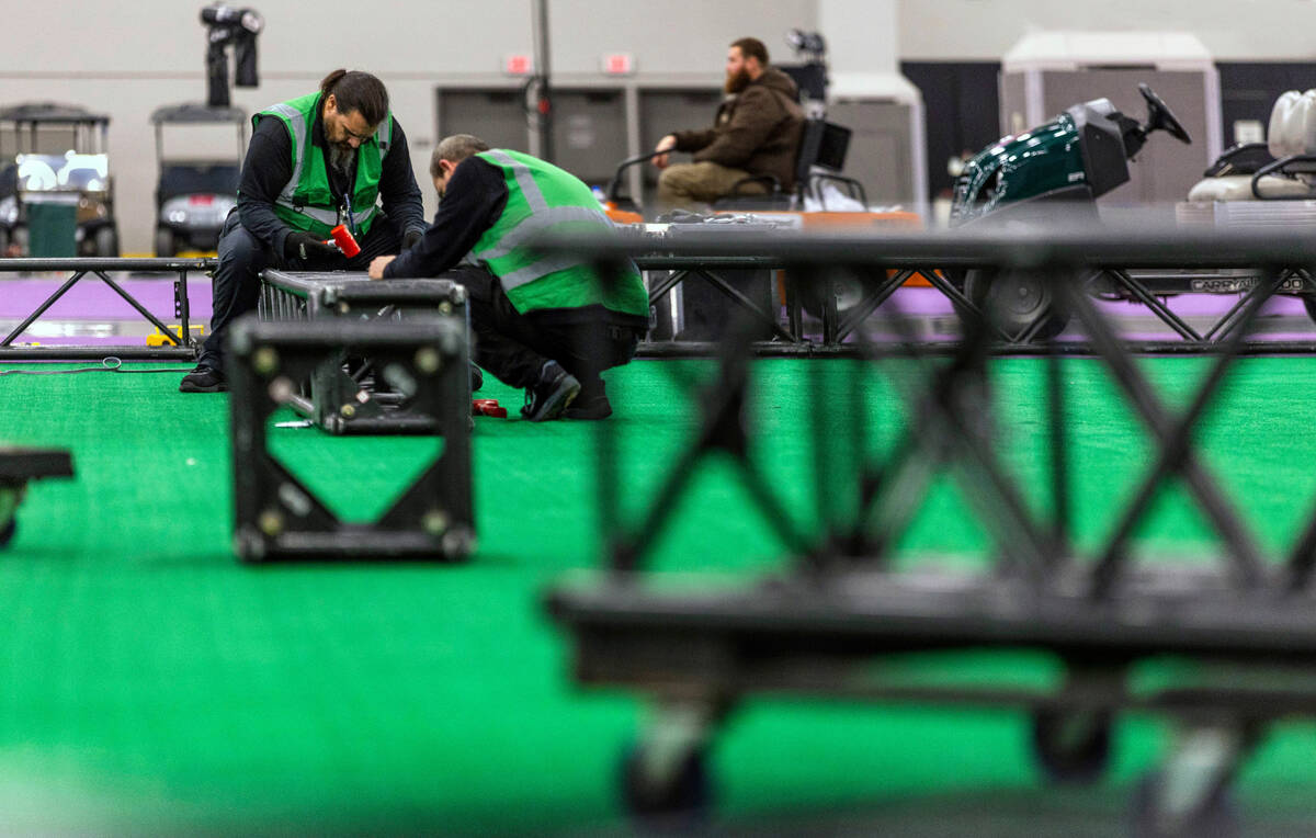 Lighting equipment is being built as set-up continues for the Super Bowl Experience in Mand...