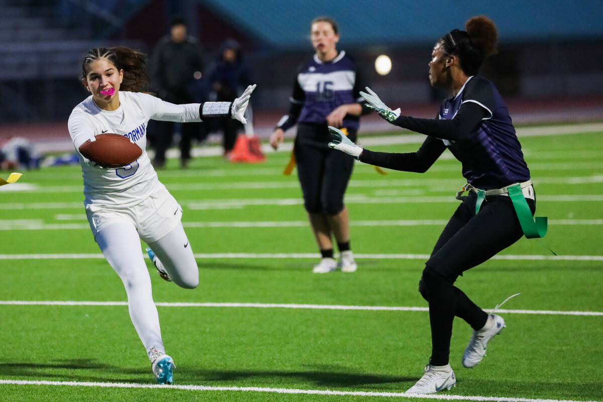 Bishop Gorman’s Niah Waldman (3) runs the ball down the field as Shadow Ridge’s K ...