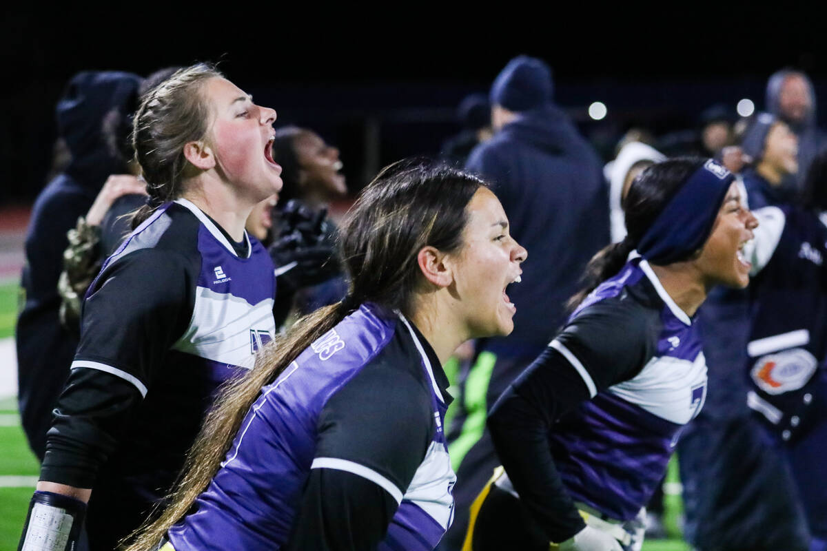 Shadow Ridge students cheer on their teammates during a flag football game between Bishop Gorma ...