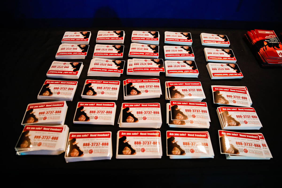 Freedom stickers with human trafficking resources on them are seen at a training course for vol ...