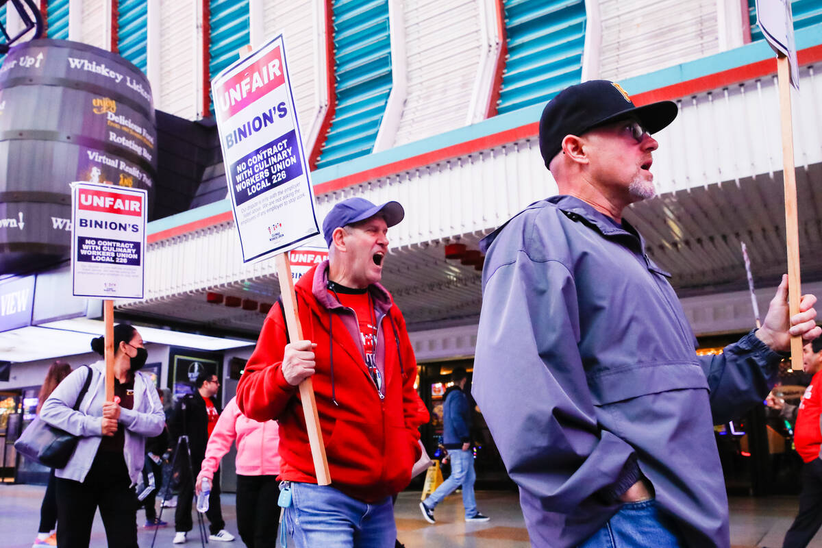 Members of the Culinary Union picket outside of Binion’s Gambling Hall & Hotel on Friday, Feb ...