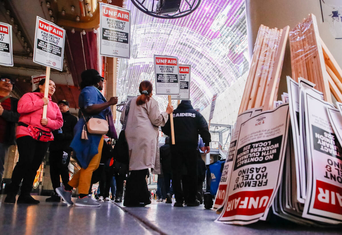 Members of the Culinary Union picket outside of Fremont Hotel & Casino on Friday, Feb. 2, 2 ...