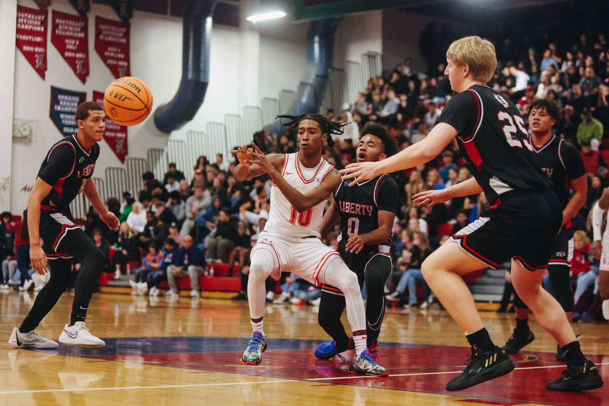 Bishop Gorman point guard Nick Jefferson (10) passes the ball to a teammate during a game betwe ...