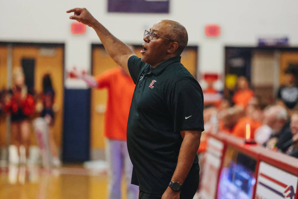 Liberty head coach Kevin Soares coaches his team from the sidelines during a game between Bisho ...