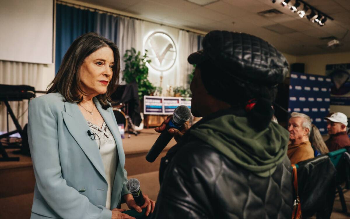 Marianne Williamson listens to a supporter during a campaign event at the Center for Spiritual ...