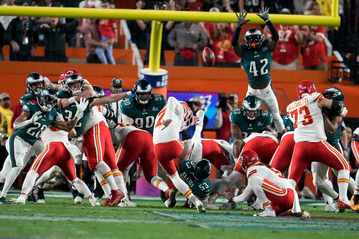 Kansas City Chiefs place kicker Harrison Butker (7) kicks the game-winning field goal during th ...