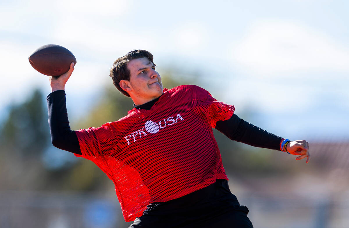 Kane Esposito of Las Vegas, a 14/15-year-old boy's contestant, throws the ball during the Punt, ...