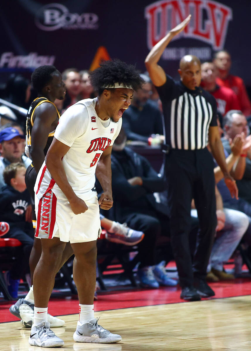 UNLV Rebels forward Rob Whaley Jr. (5) celebrates after helping to pressure Wyoming Cowboys int ...