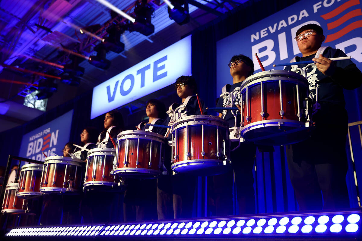 The Robert O. Gibson Leadership Academy drumline performs during a campaign event for President ...