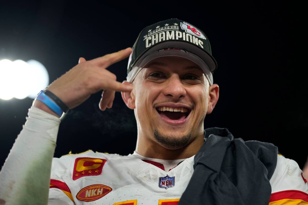 Kansas City Chiefs quarterback Patrick Mahomes (15) celebrates after the AFC Championship NFL f ...