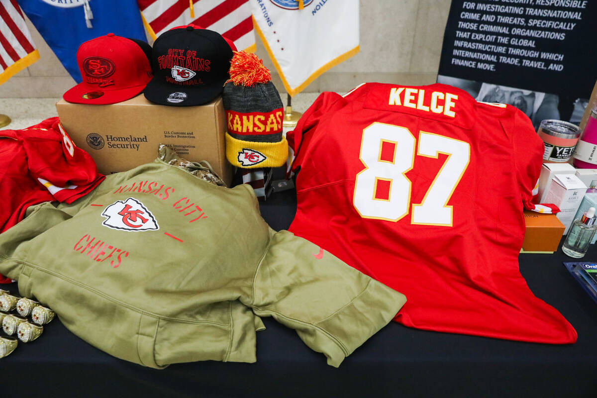 A display of fake super bowl paraphernalia is seen during a Super Bowl LVIII safety press confe ...