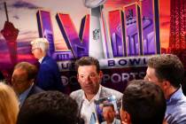 CBS Sports color commentator Tony Romo answers questions during a news conference at Mandalay B ...