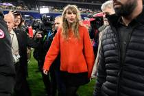 Taylor Swift walks on the field after the AFC Championship NFL football game between the Baltim ...