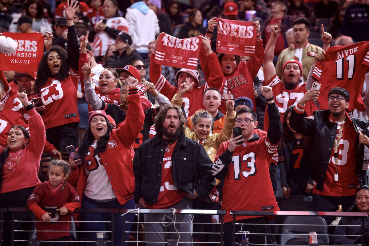 San Francisco 49ers cheer for their team during Super Bowl Opening Night festivities at Allegia ...