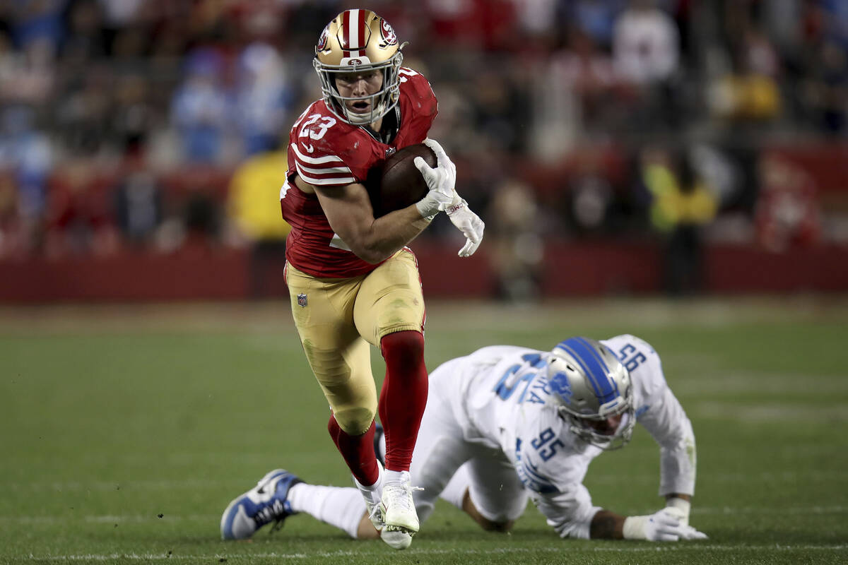 San Francisco 49ers running back Christian McCaffrey (23) runs during the NFC Championship NFL ...