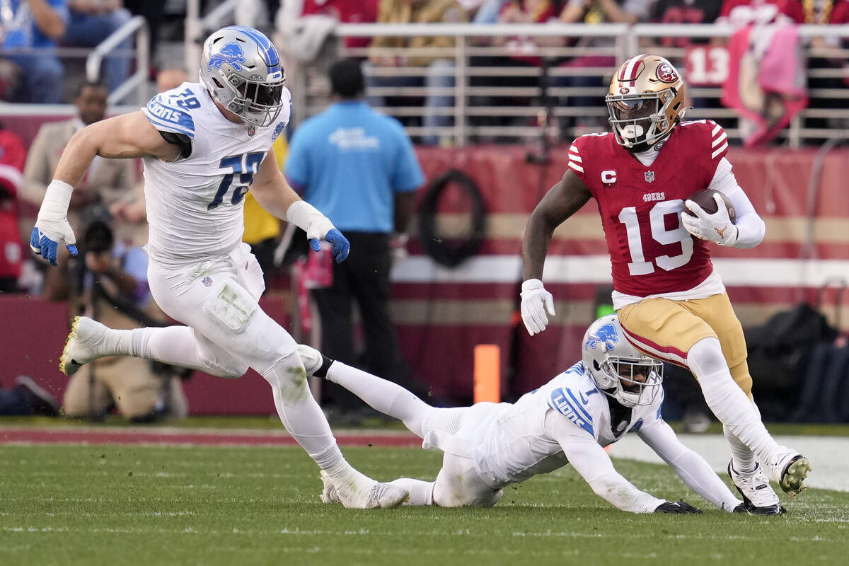 San Francisco 49ers wide receiver Deebo Samuel runs against the Detroit Lions during the first ...