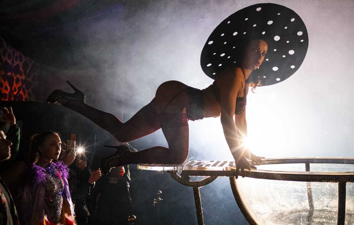 Contortionist Yulya Mihailova performs at Frooog’s Camp House on Hacienda, outside of the Lux ...