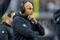 Raiders interim head coach Antonio Pierce watches the team play from the sideline during the fi ...