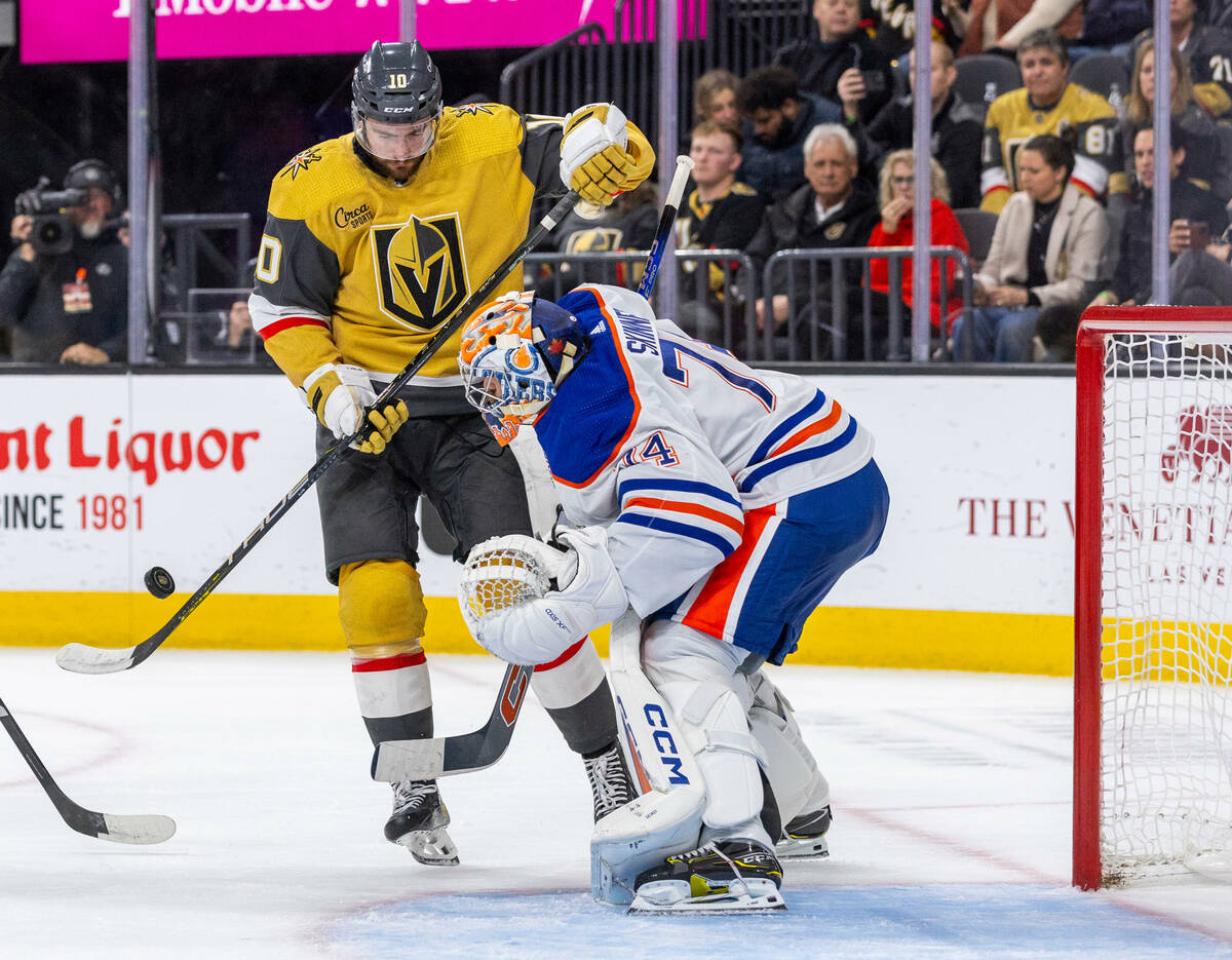 Golden Knights center Nicolas Roy (10) looks to shoot against Edmonton Oilers goaltender Stuart ...