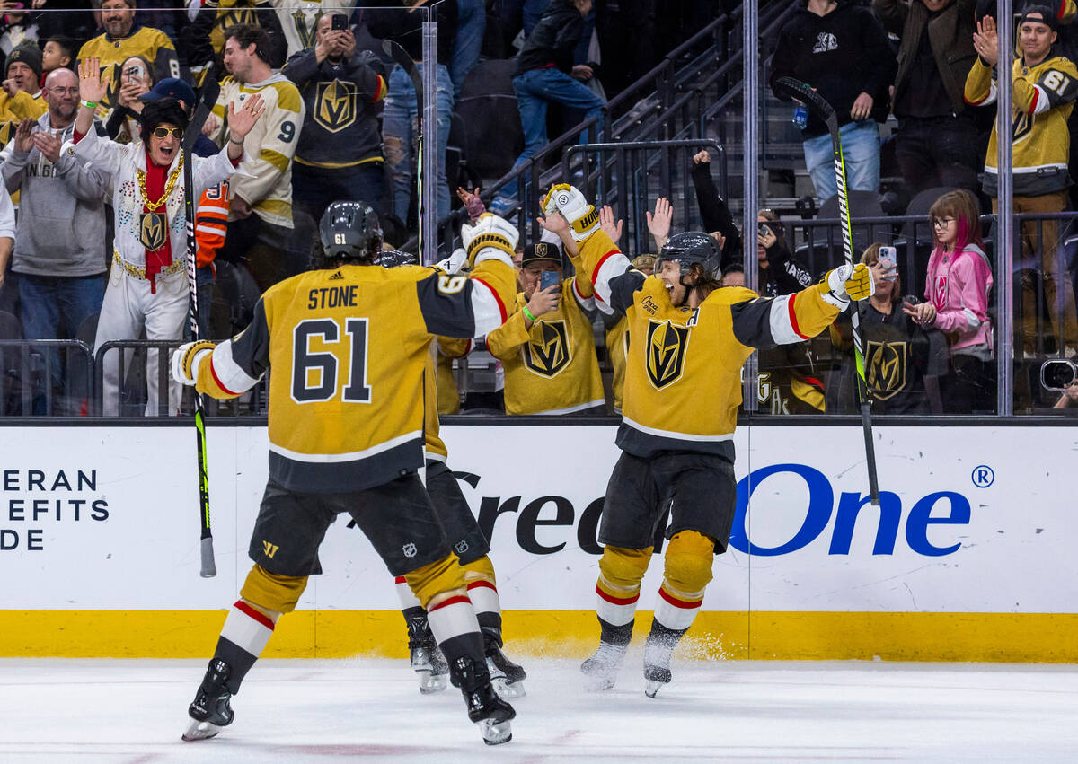 Golden Knights center William Karlsson (71) has a goal celebrated with teammates over the Edmon ...