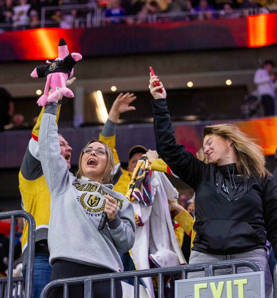 Golden Knights fans dance after a third goal against the Edmonton Oilers during the third peri ...