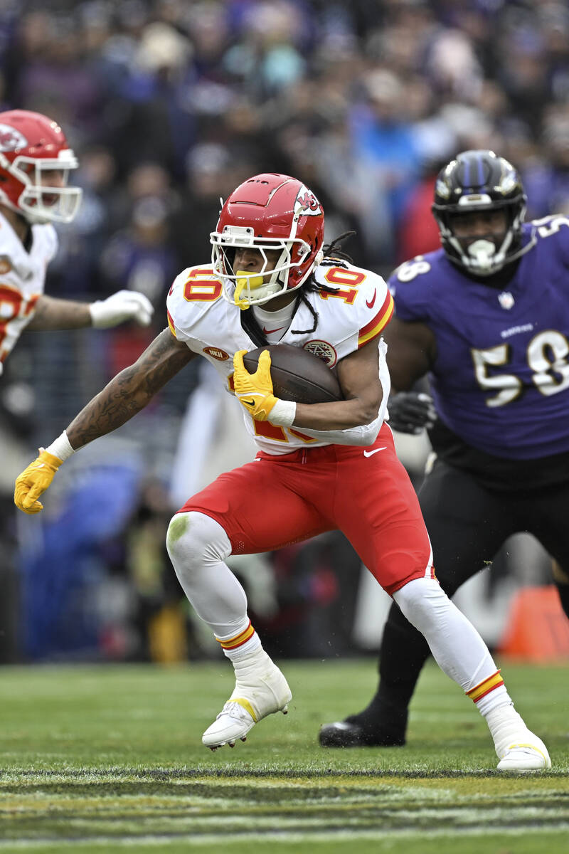 Kansas City Chiefs running back Isiah Pacheco (10) runs the ball during the first half of the A ...