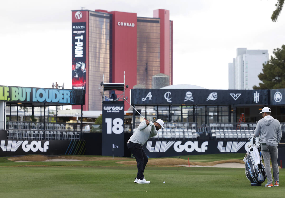 Jon Rahm prepares to hit onto the 18th green during LIV Golf Las Vegas Pro-Am tournament at Las ...
