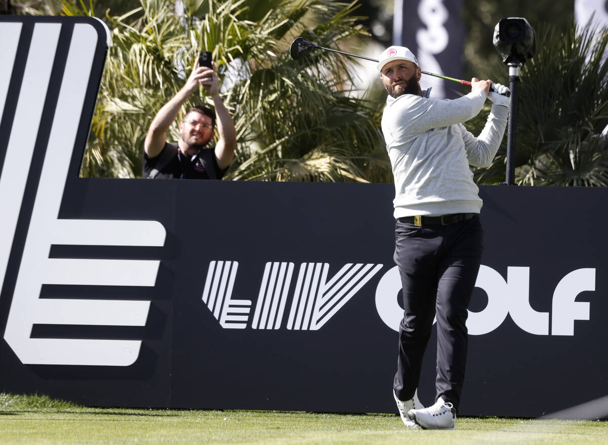 Jon Rahm watches his tee shot during LIV Golf Las Vegas Pro-Am tournament at Las Vegas Country ...