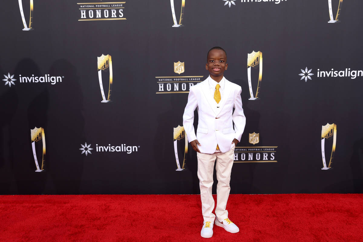 Jeremiah Fennell, 11, of Las Vegas, walks on the red carpet before the annual NFL Honors awards ...