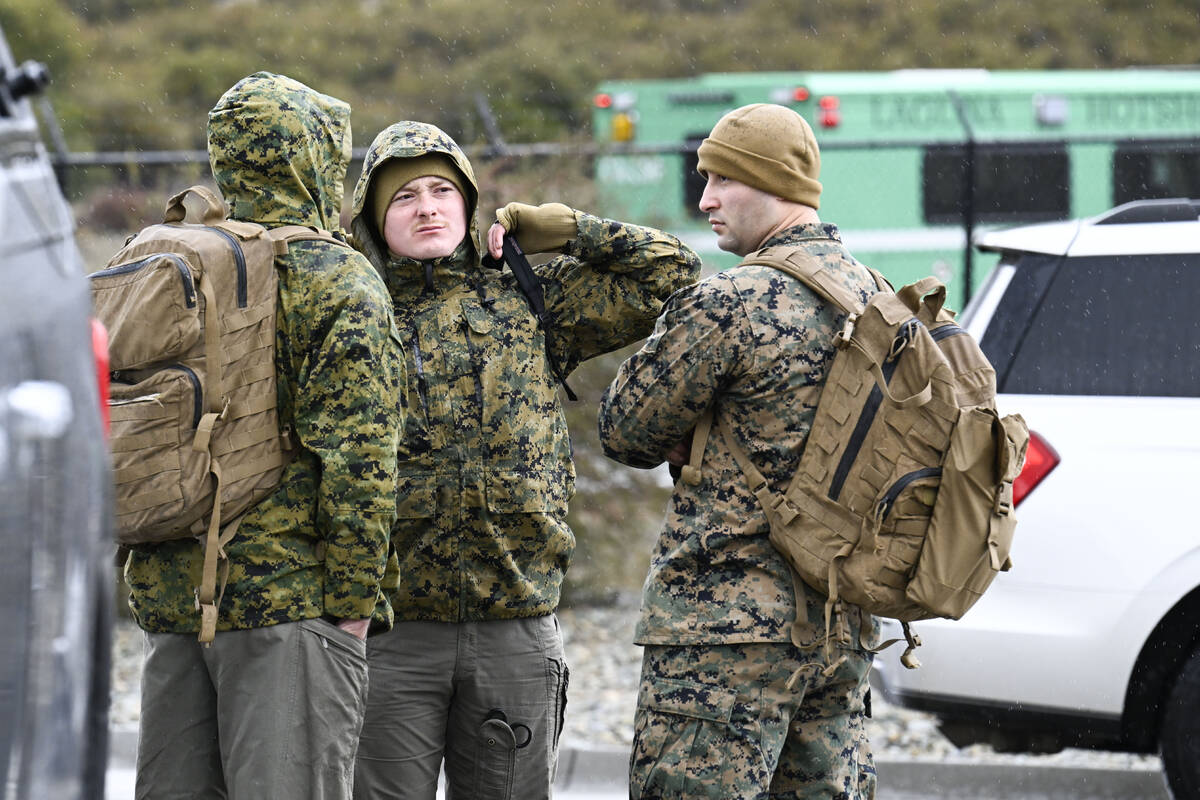 U.S. Marines wait to leave a command center, Wednesday, Feb. 7, 2024, in Kitchen Creek, Calif. ...