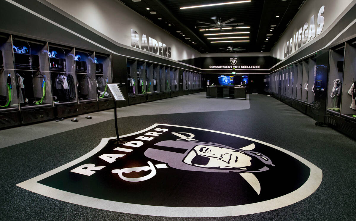 A large logo is painted on the floor in the expansive locker room within the Intermountain Heal ...