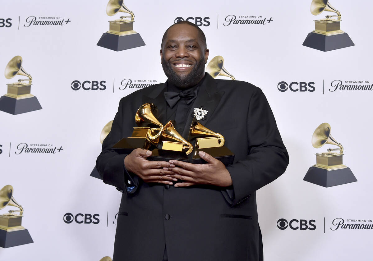 Killer Mike poses in the press room with the awards for best rap performance and best rap song ...