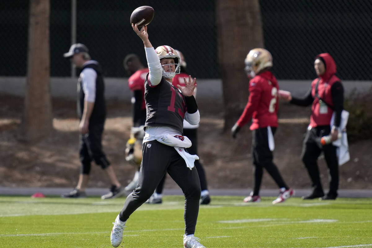 San Francisco 49ers quarterback Brock Purdy (13) throws during practice ahead of the Super Bowl ...