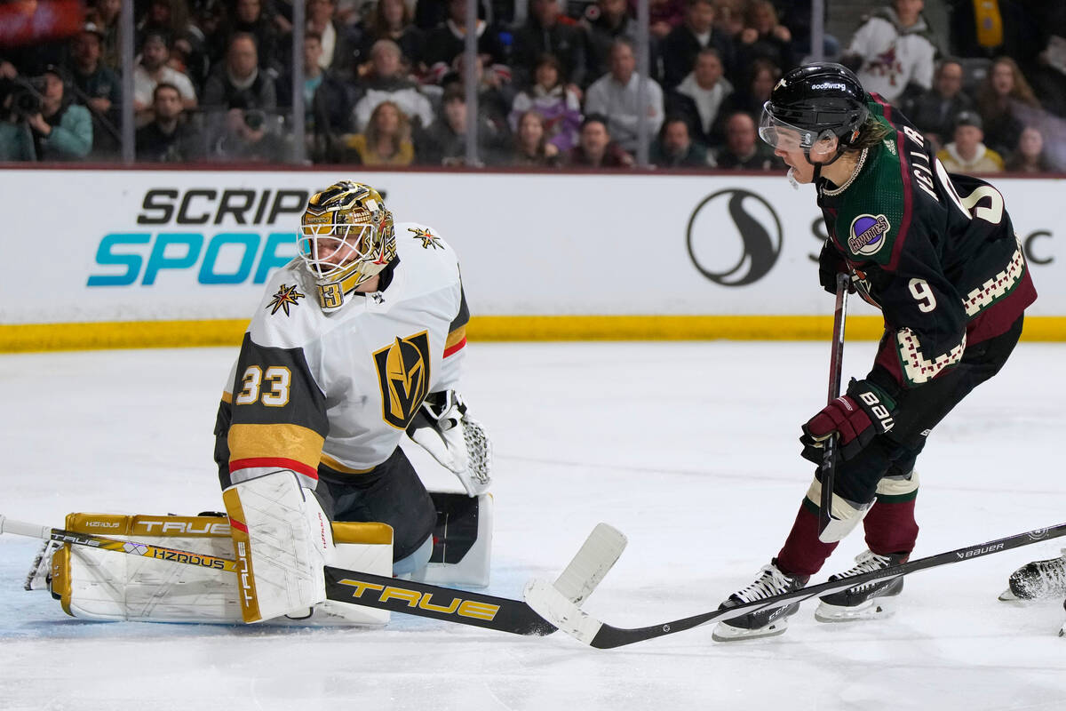 Arizona Coyotes right wing Clayton Keller (9) scores a goal on Vegas Golden Knights goaltender ...