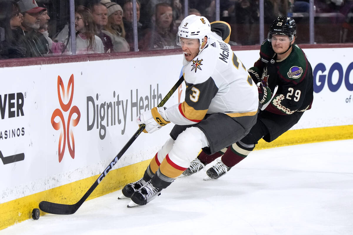 Vegas Golden Knights defenseman Brayden McNabb (3) shields the puck from Arizona Coyotes center ...