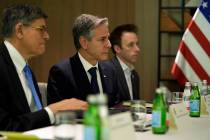 U.S. Secretary of State Antony Blinken, centre, meets with Israeli opposition leader Yair Lapid ...
