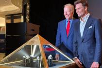 Jim Gray and Tom Brady are shown with Brady's seven Super Bowl rings at Fontainebleau's Urs Fis ...