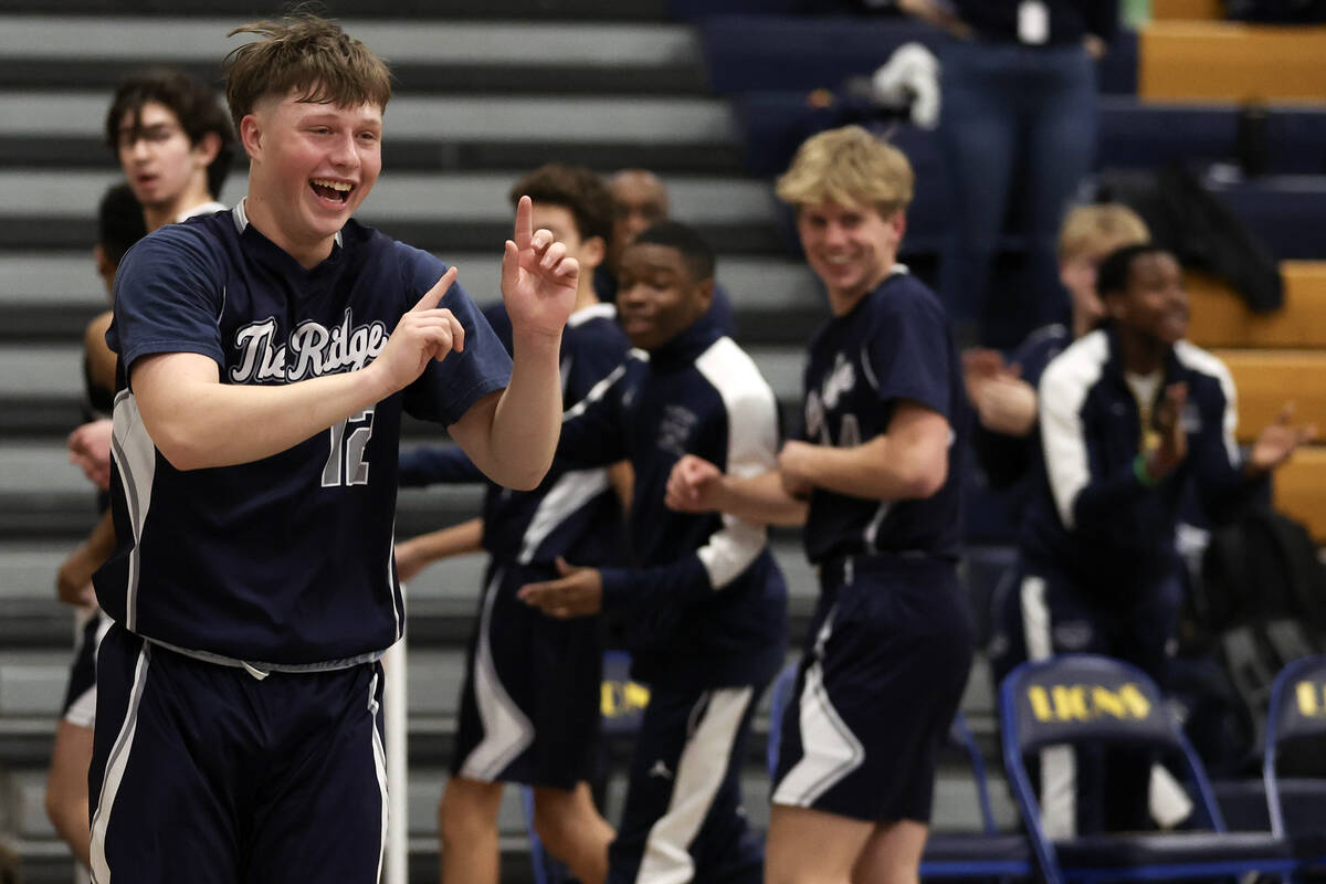 Shadow Ridge guard Aiden Maynor (12) celebrates after his team tied the game going into halftim ...
