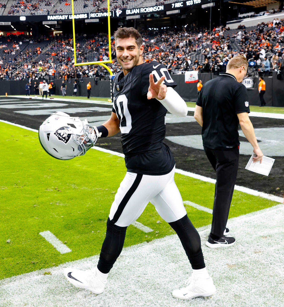 Raiders quarterback Jimmy Garoppolo (10) takes the field to face the Denver Broncos during an N ...