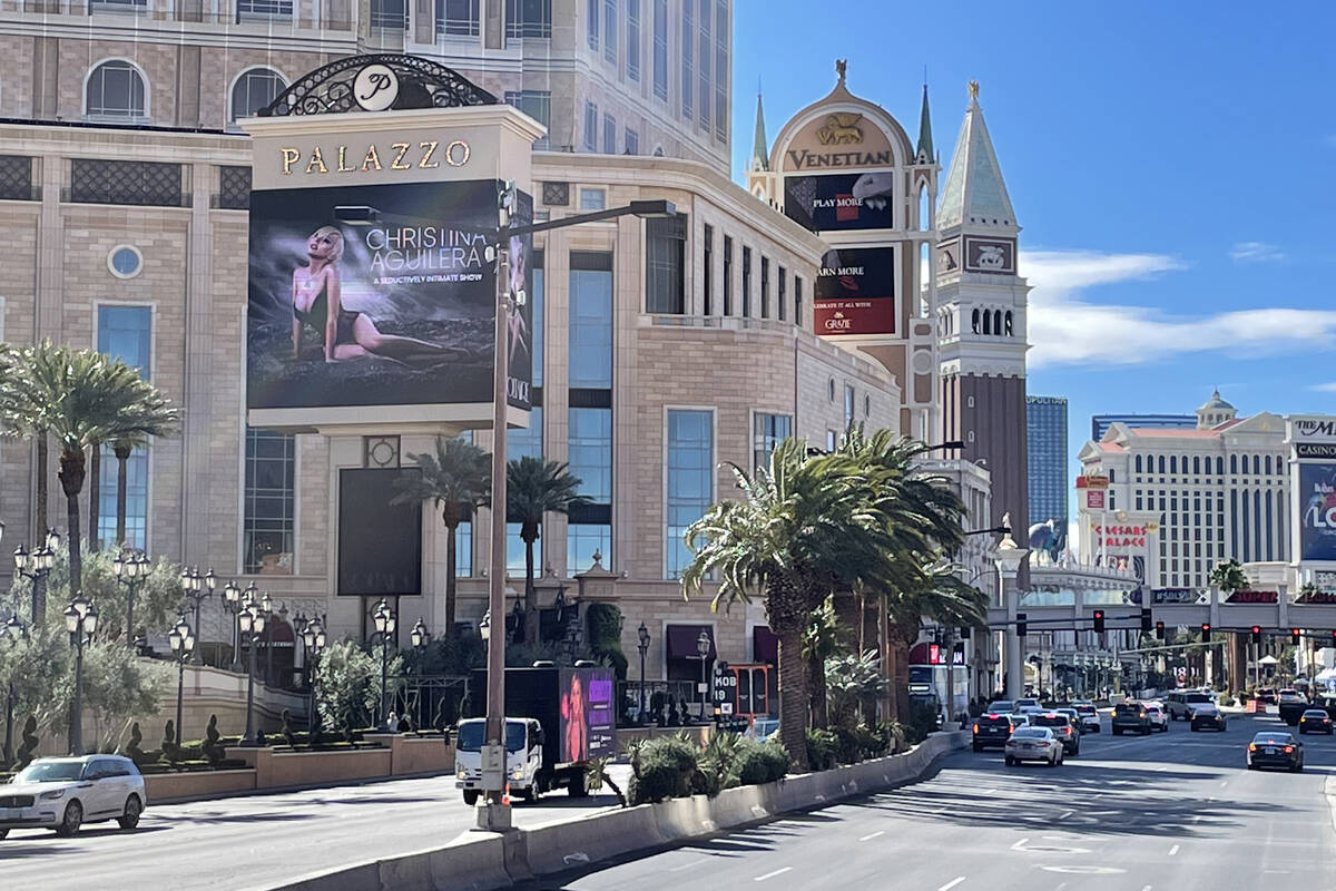 Pedestrian and vehicle traffic is light on the Las Vegas Strip near Treasure Island on Saturday ...