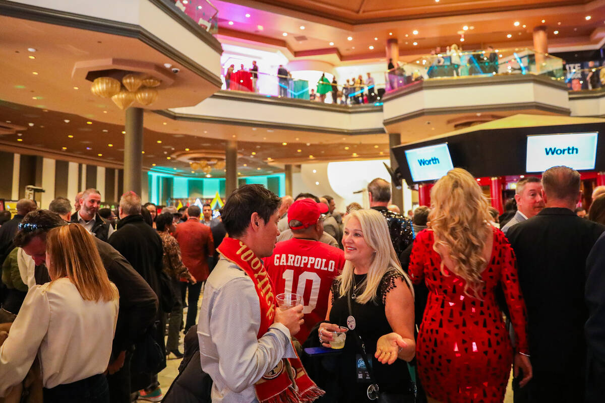 People mingle at Leigh Steinberg’s 37th Annual Super Bowl Party on Saturday, Feb. 10, 20 ...