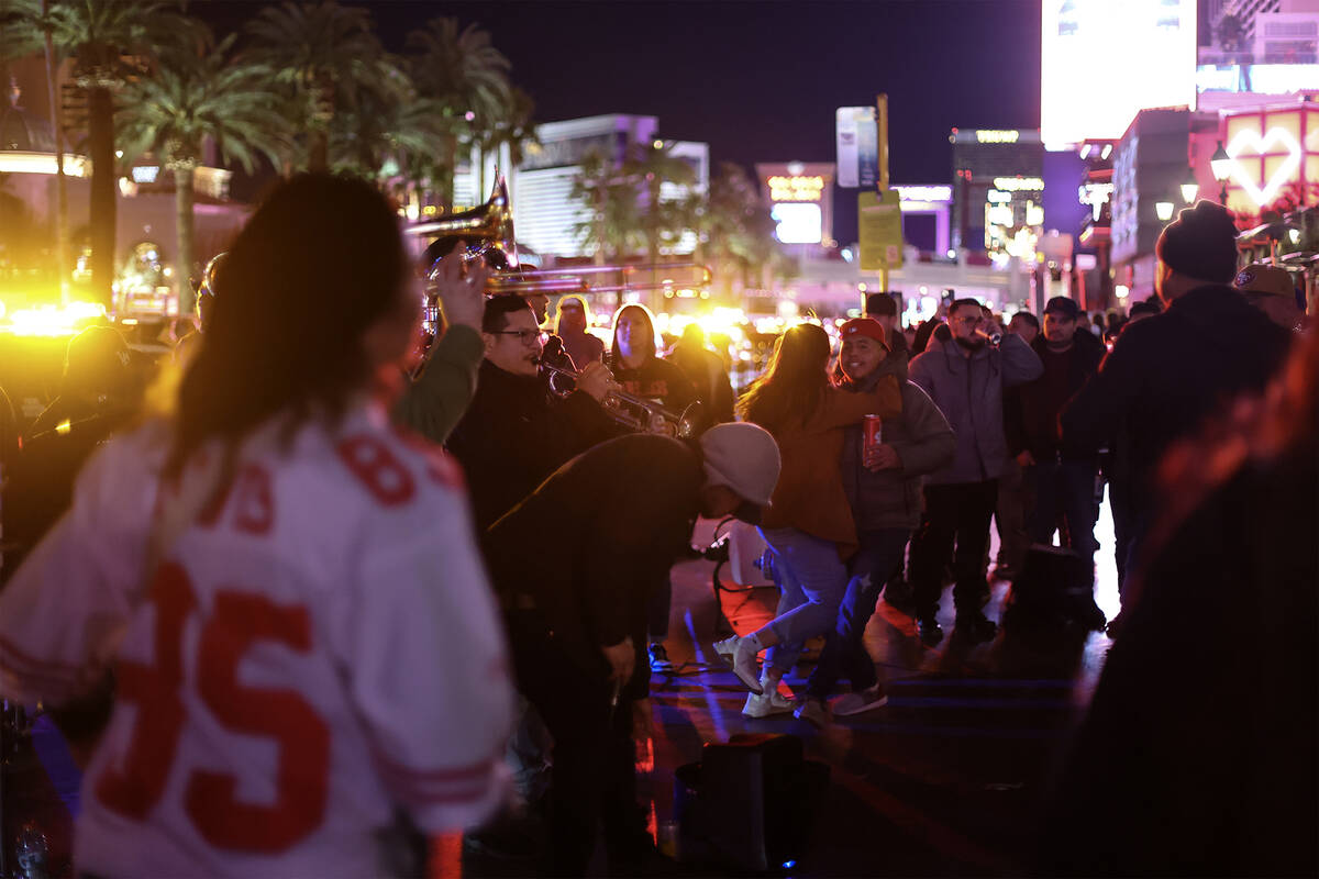 Mariachi bands play for football fans as they celebrate the Super Bowl Saturday, Feb. 10, 2024, ...