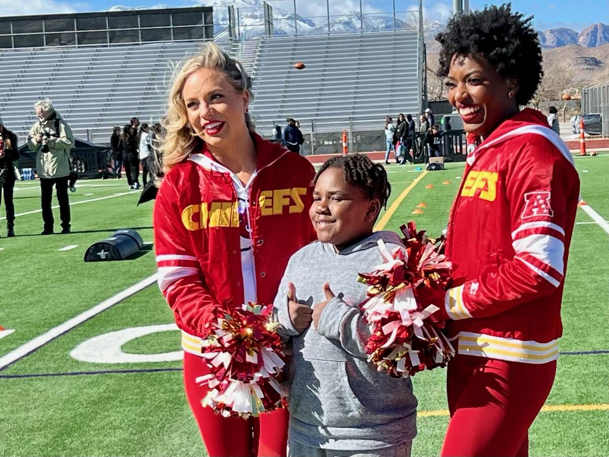 Families mingled with players, cheerleaders and mascots Saturday morning during the NFL Play Fo ...