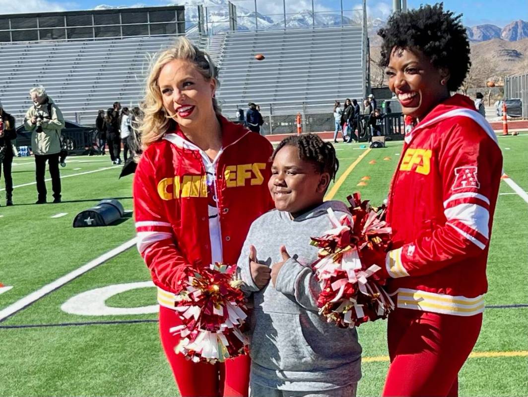 Families mingled with players, cheerleaders and mascots Saturday morning during the NFL Play Fo ...
