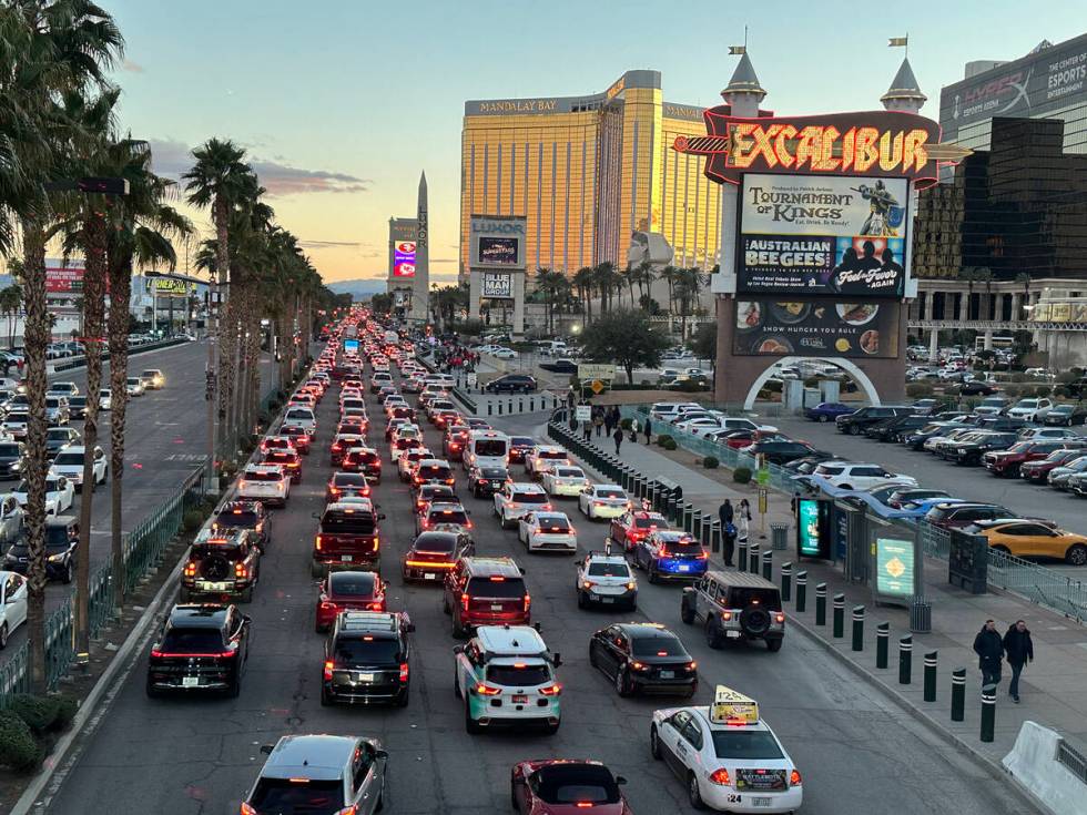 Jammed traffic on the Las Vegas Strip as seen from a pedestrian bridge on Tropicana Avenue on S ...
