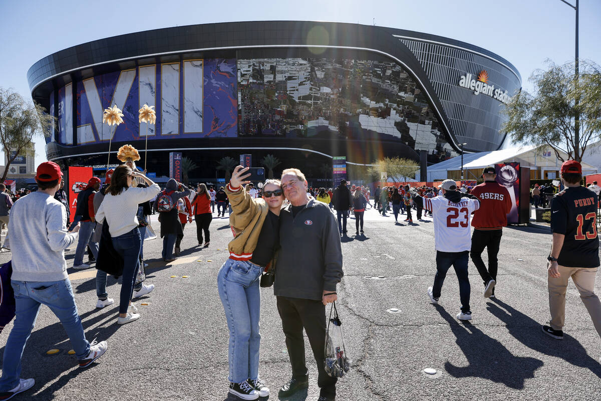 Isabelle Borges and her father George Borges, both from San Francisco, take a selfie upon arriv ...