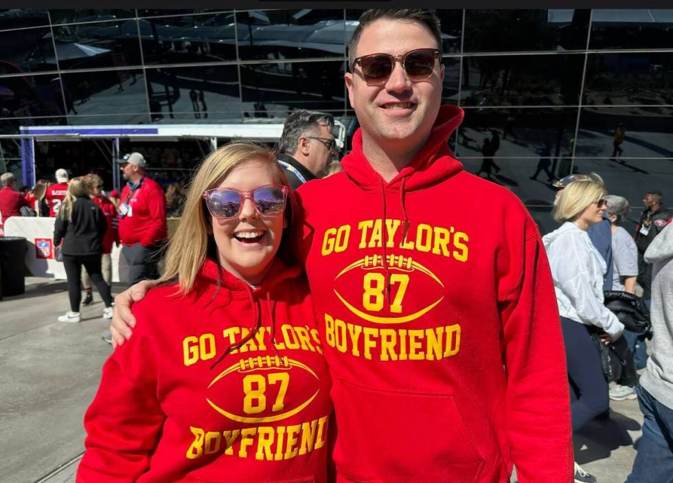 Caroline Funkhouser, 33, and Daniel Wilson-Hill, 30, of North Carolina, stand outside Allegiant ...