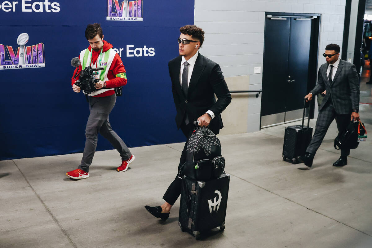 Kansas City Chiefs quarterback Patrick Mahomes makes his entrance for Super Bowl LVIII at Alleg ...