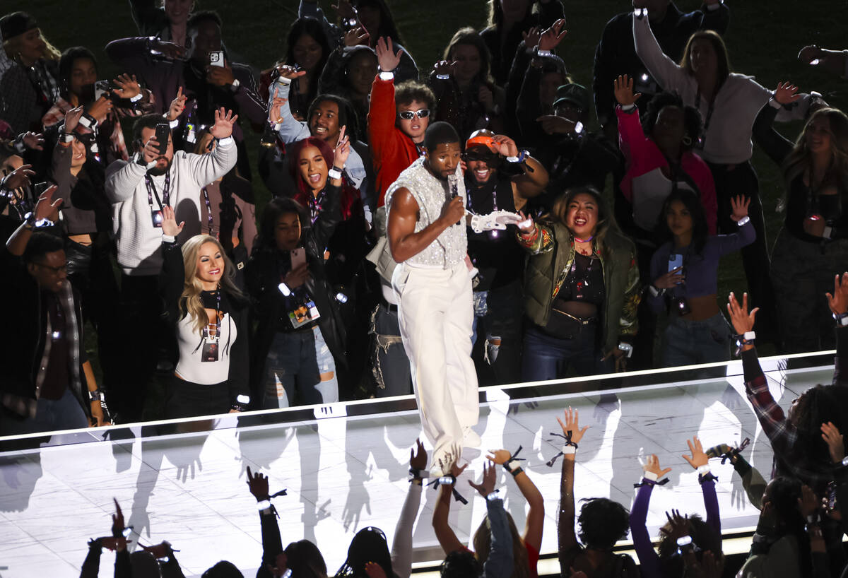 Usher performs during the halftime show at Super Bowl 58 at Allegiant Stadium on Sunday, Feb. 1 ...